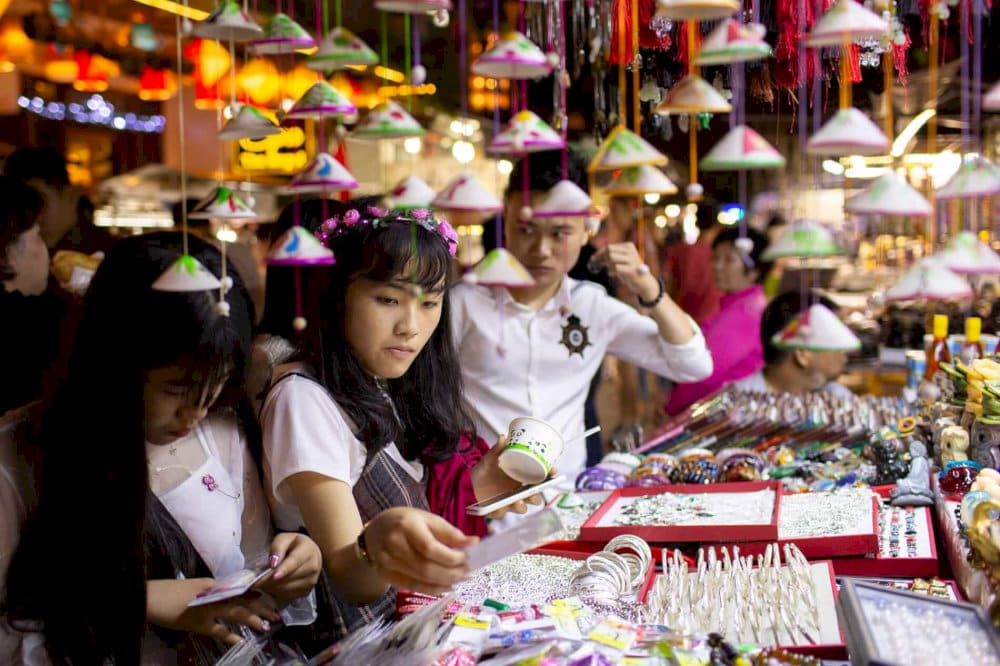 Immerse yourself in the bustling atmosphere and magical beauty of Hoi An night market